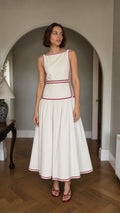 Front view of White embroidered sleeveless midi dress