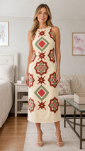 Front view of cream geometric embroidered midi dress
