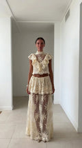 Front view of model wearing ivory lace two-piece set