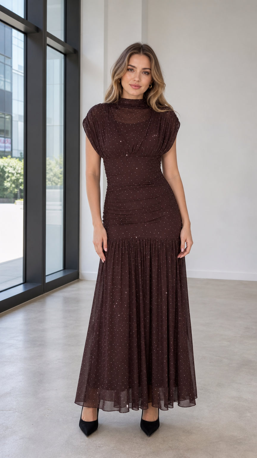 Front view of model wearing brown glitter mesh maxi dress