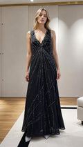 Model wearing Black Beaded V-Neck Maxi Evening Dress front view