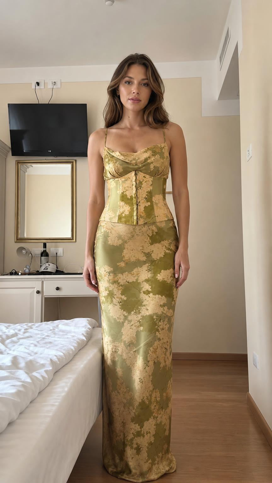 Front view of olive floral satin corset and maxi skirt set