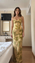 Front view of olive floral satin corset and maxi skirt set