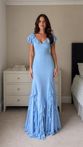 Front view of model wearing Light Blue ruffled V-neck maxi dress