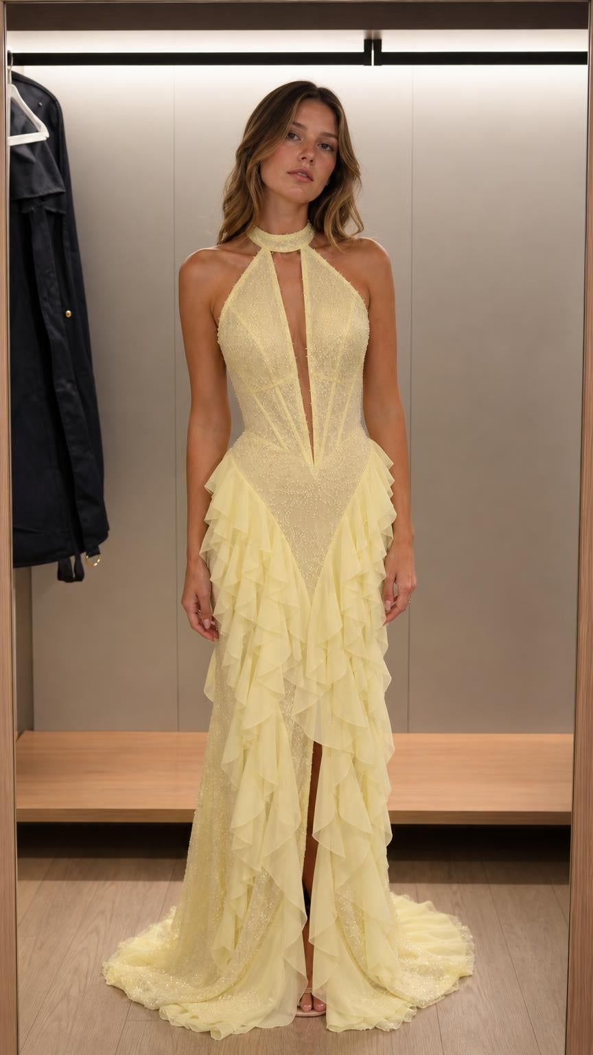 Front view of yellow halter neck beaded ruffle maxi dress