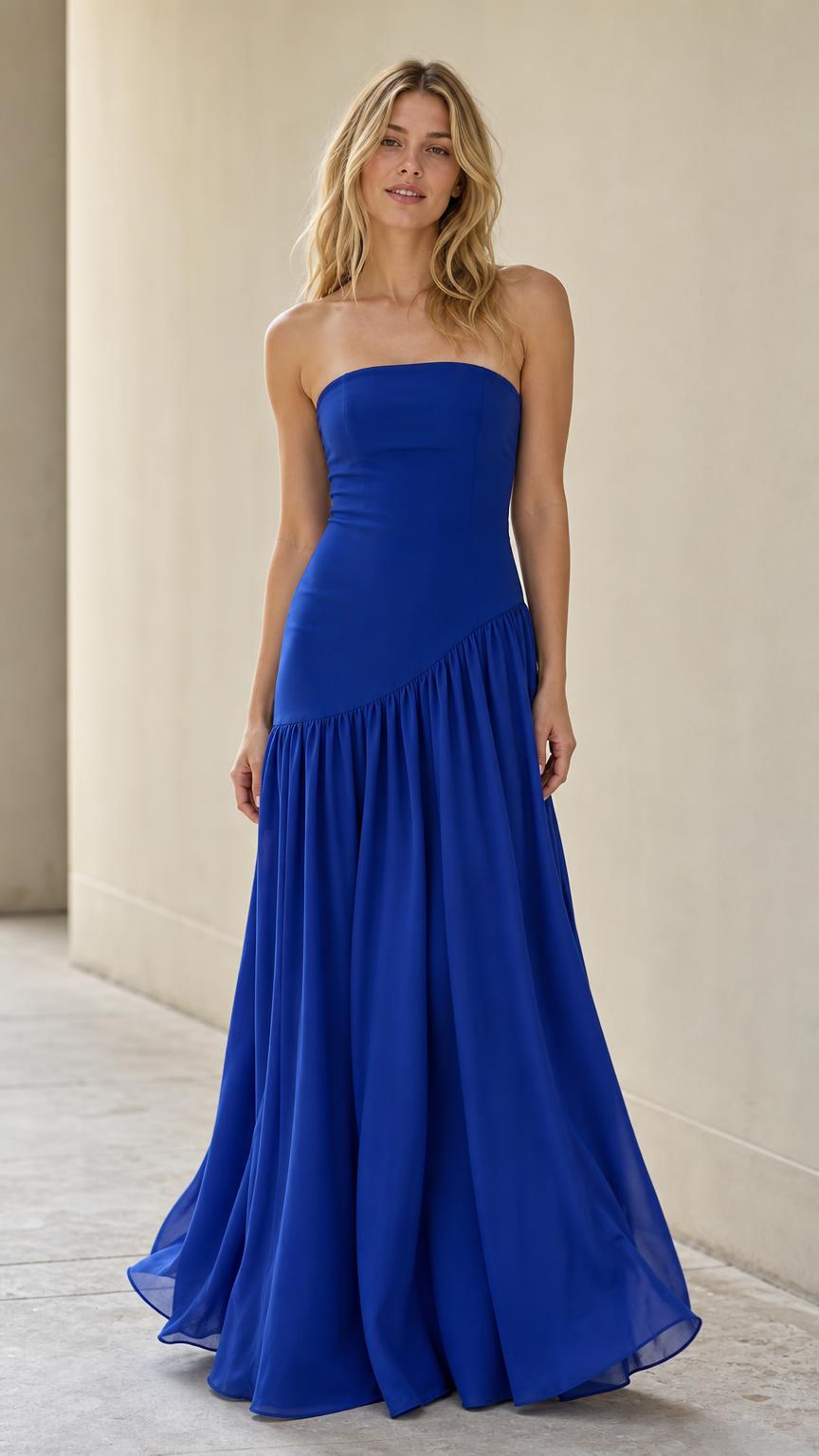 Front view of model wearing royal blue strapless maxi dress