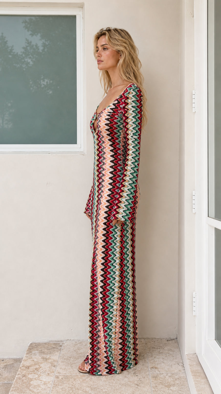 Side profile of model in Multicolor chevron knit maxi dress