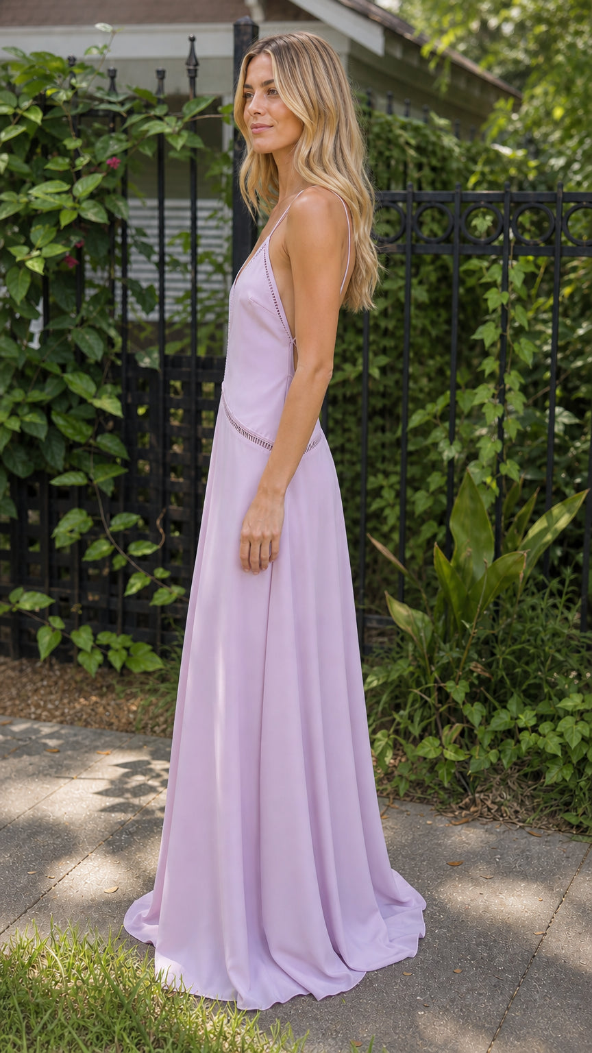 Side profile of model in lavender maxi dress outdoors