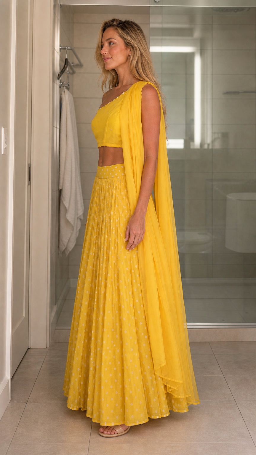Side profile of model in yellow ethnic two-piece set