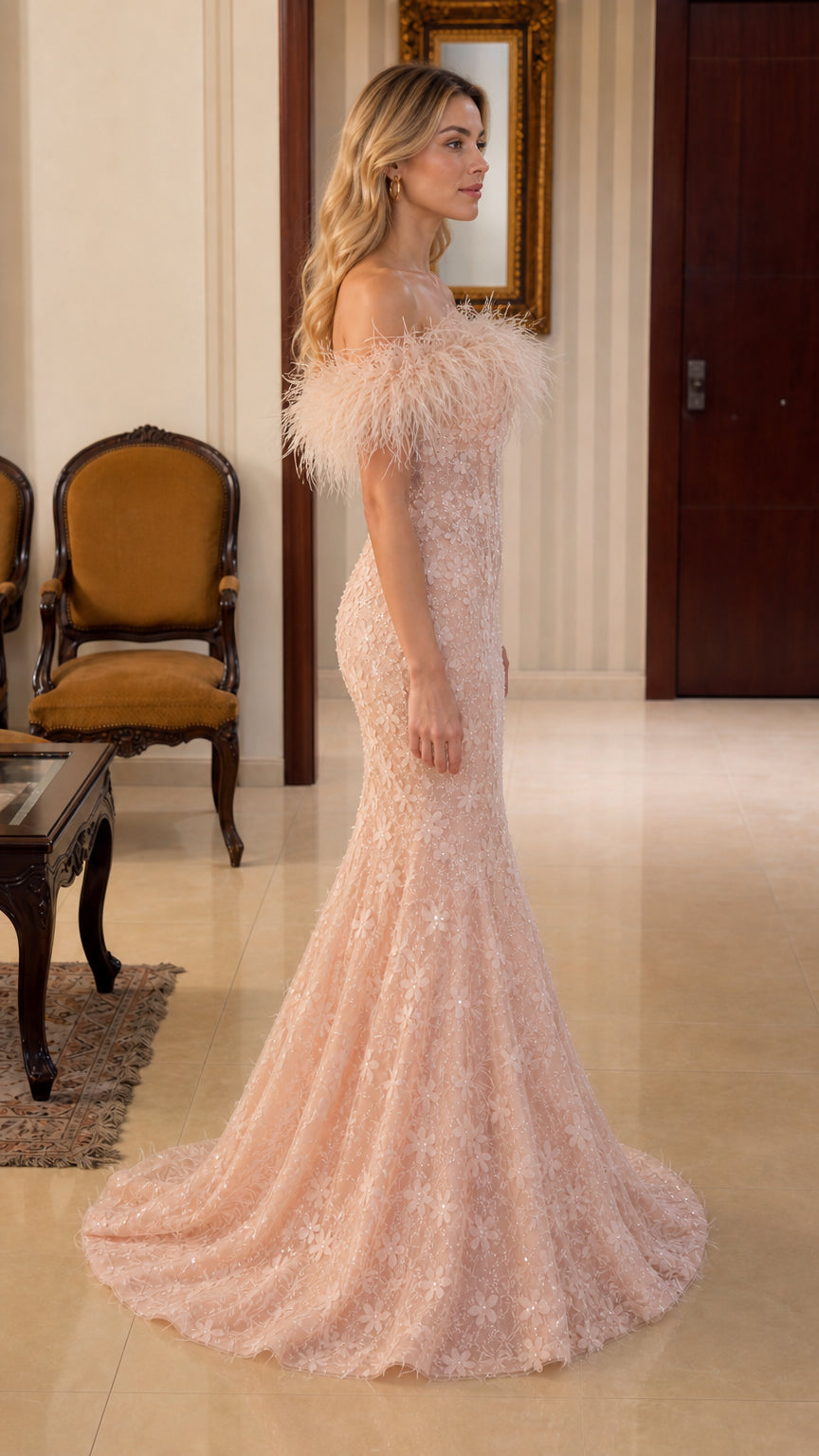 Side profile of blush pink evening gown with sweep train