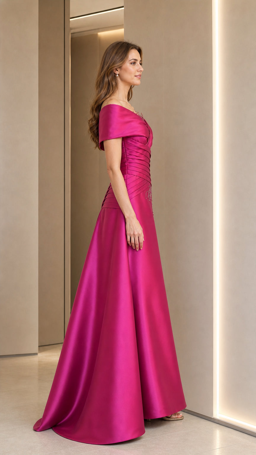 Side profile view of fuchsia evening gown