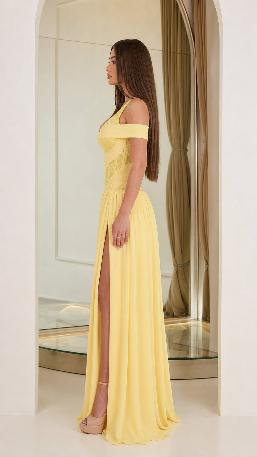 Side profile view of yellow evening gown
