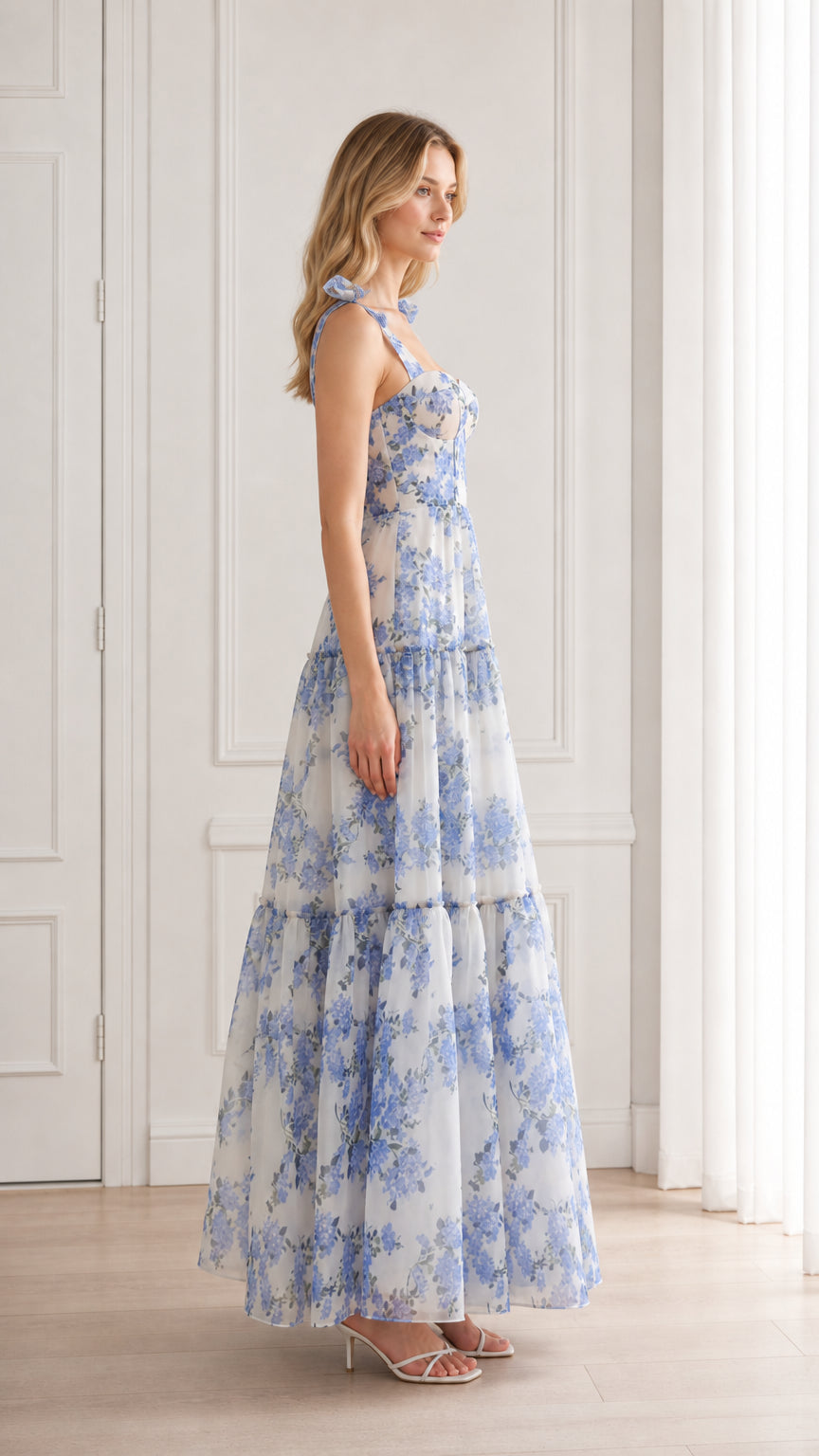 Side view of blue floral tiered maxi dress