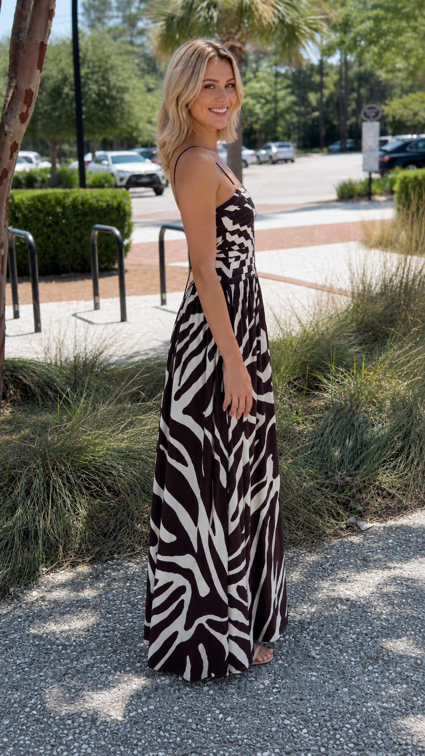 Side profile of black abstract print maxi dress