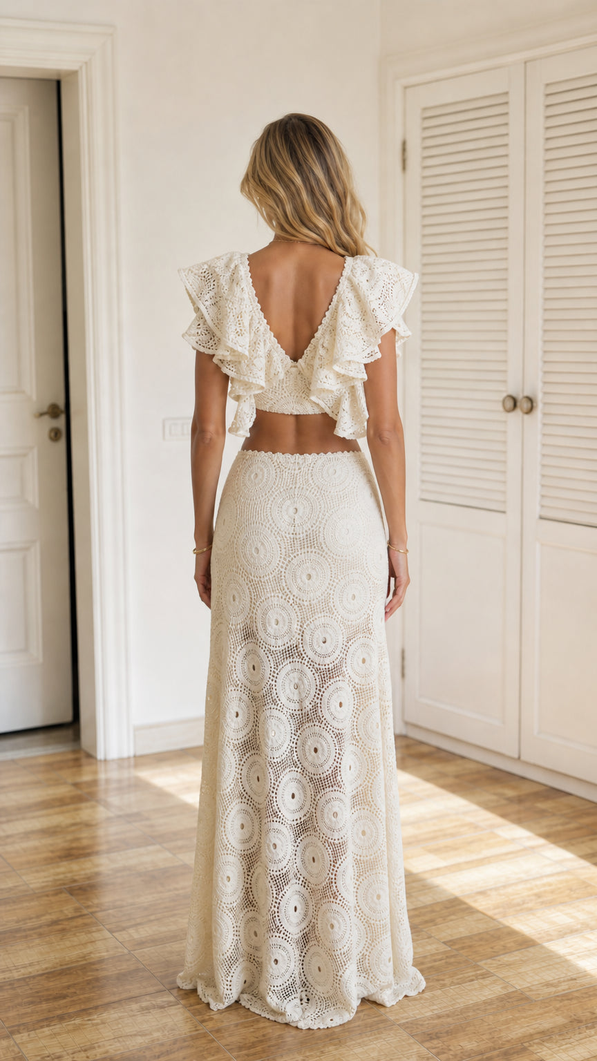 Back view of ivory crochet two-piece set showing back ruffle detail
