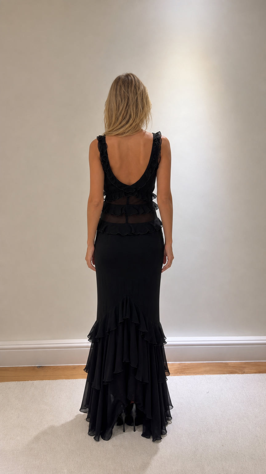 Back view of black maxi dress with scoop back
