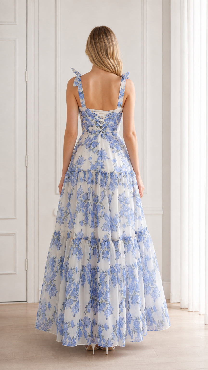 Back view of blue floral maxi dress with laced detail