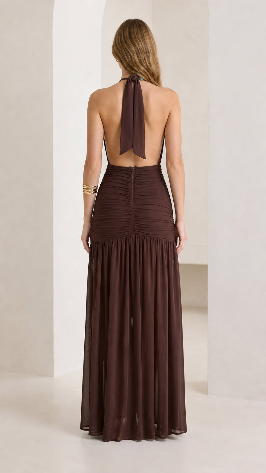 Back view of brown halter neck ruched maxi dress