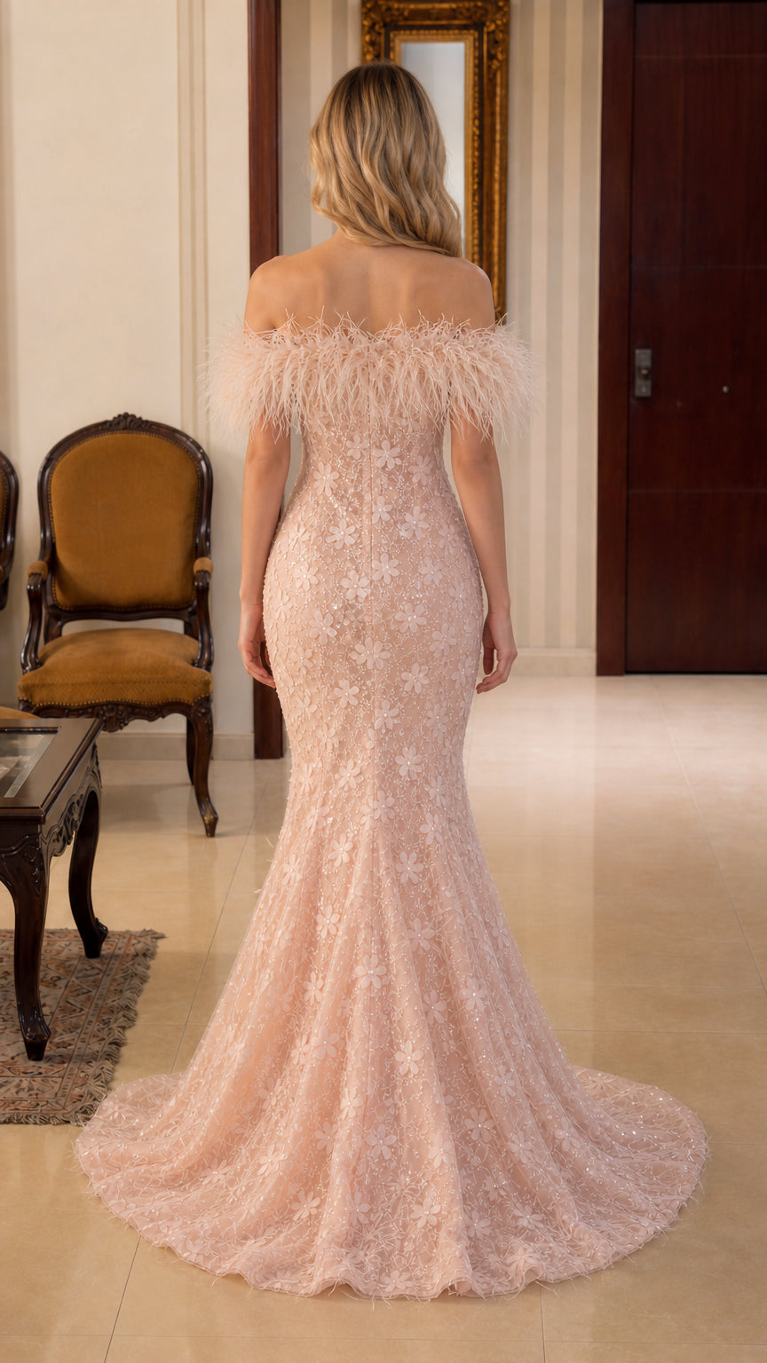 Back view of blush pink formal dress showing silhouette