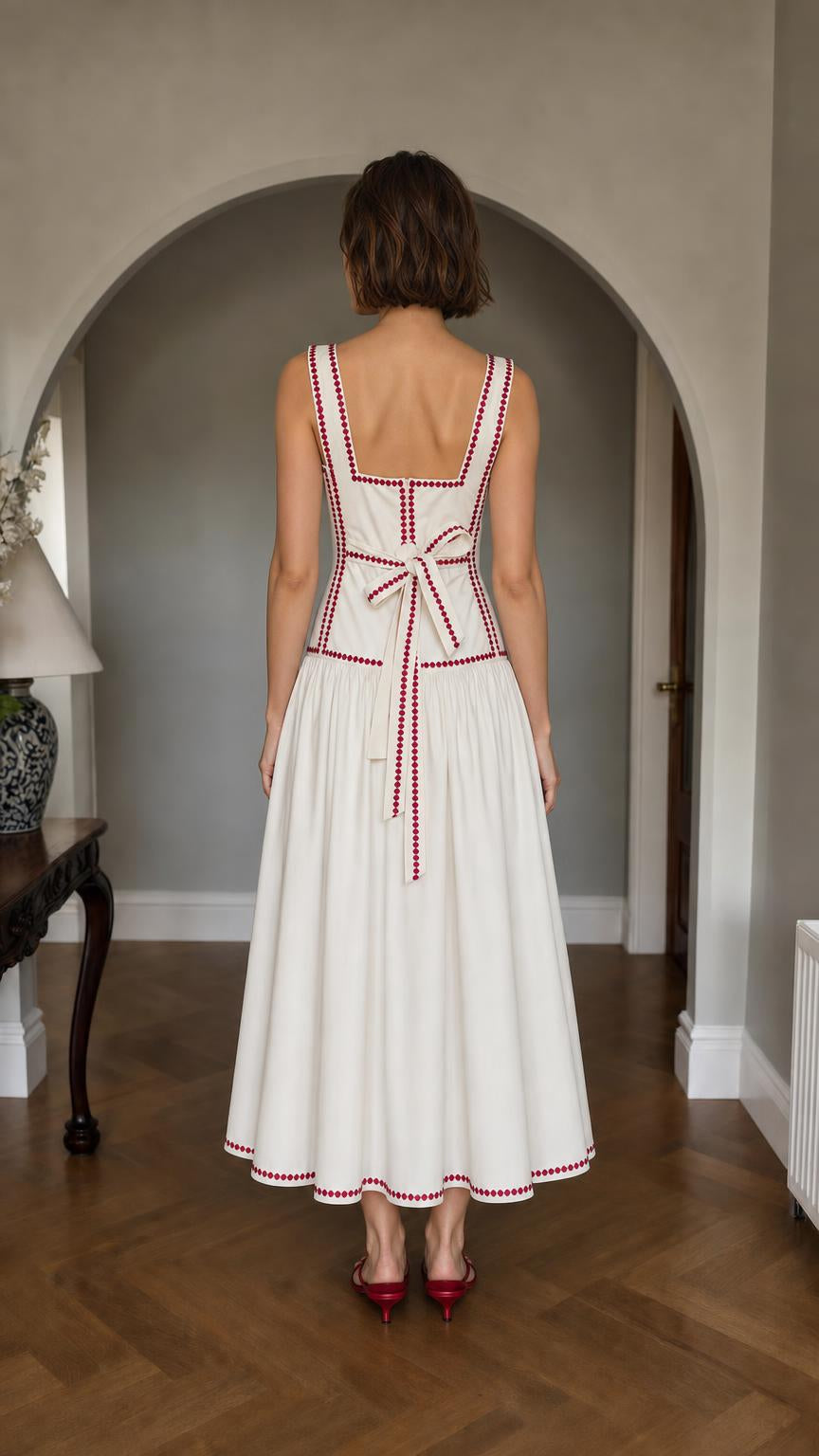 Back view showing tie detail on White midi dress