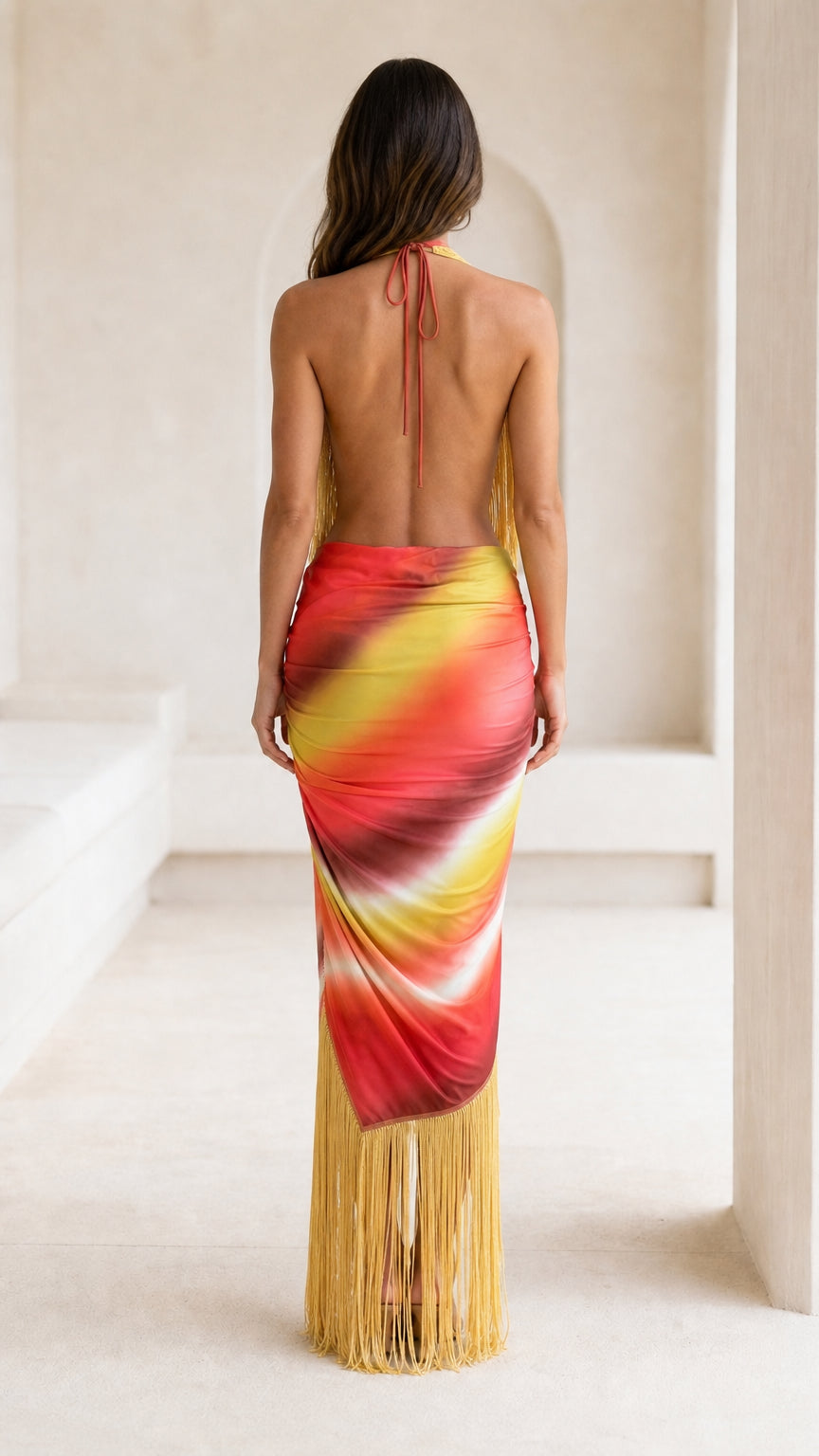Back view showing open back design of the maxi dress