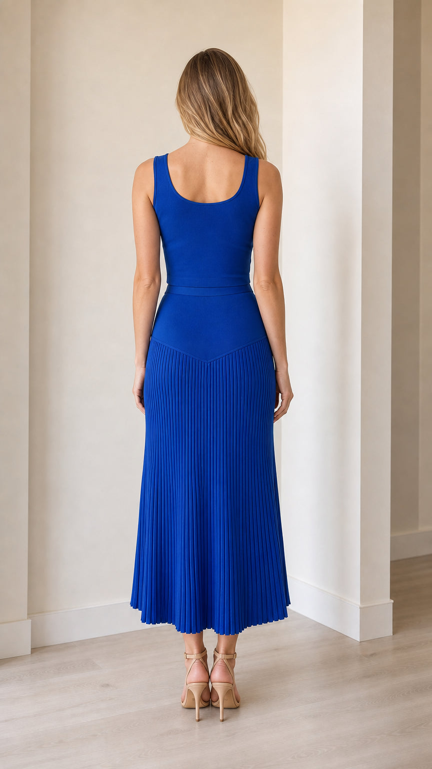 Model wearing royal blue two-piece set back view