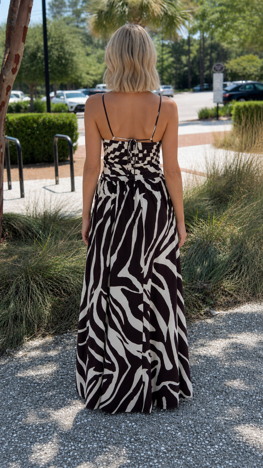 Back view showcasing smocked bodice and tie detail