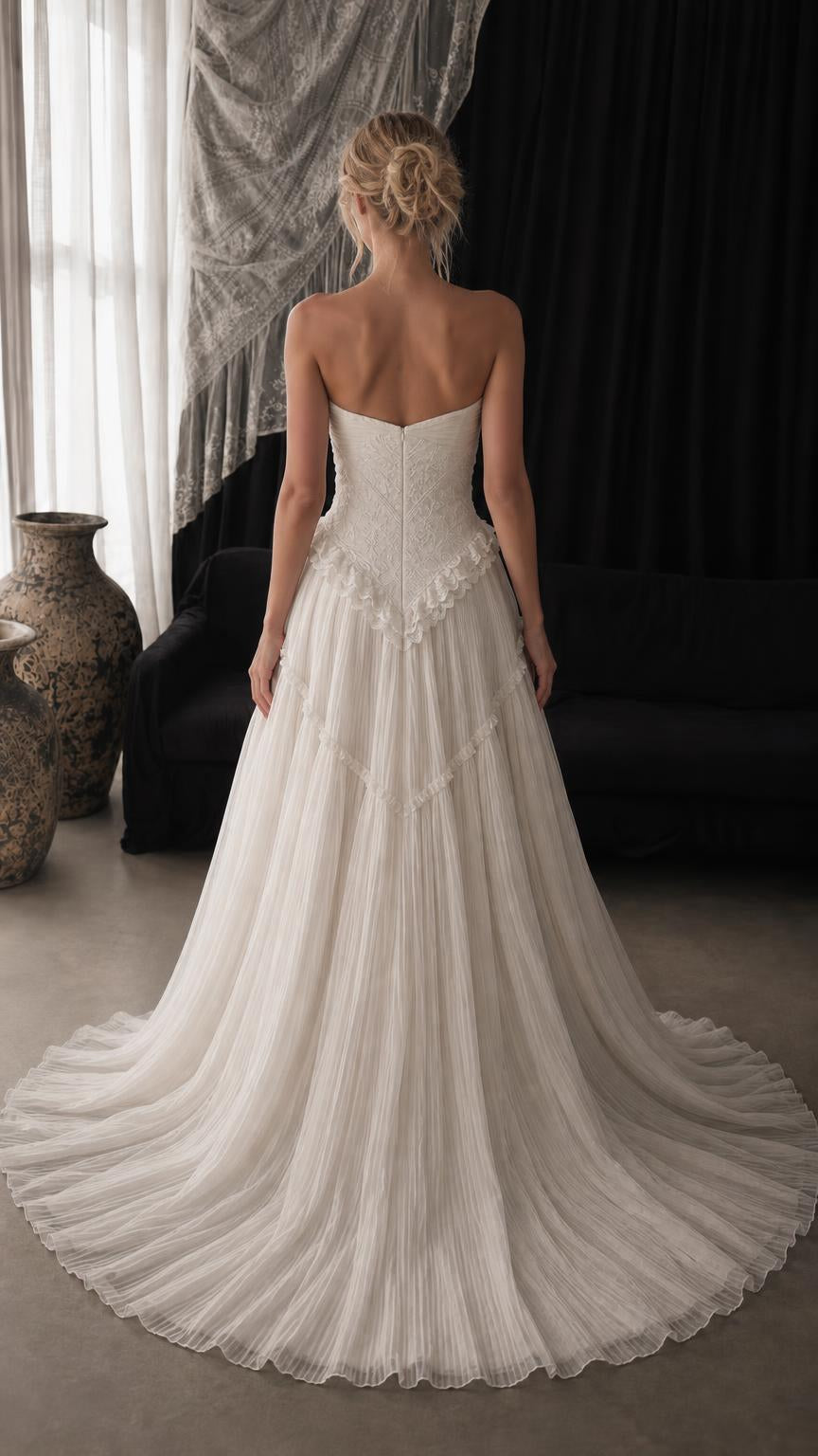 Back view of white strapless evening gown