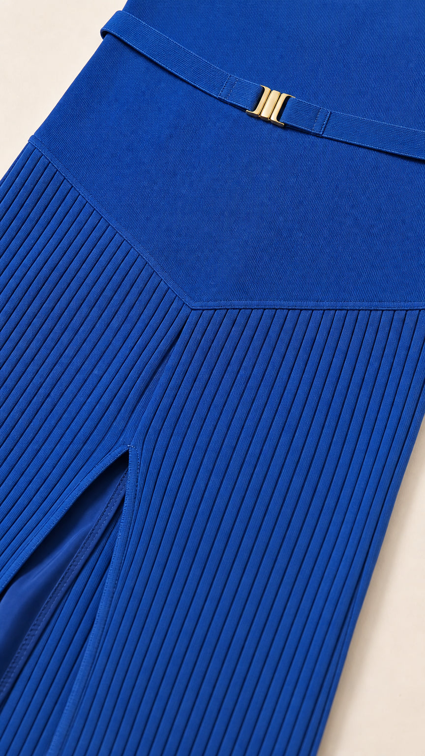 Close-up of royal blue skirt waistband and belt detail
