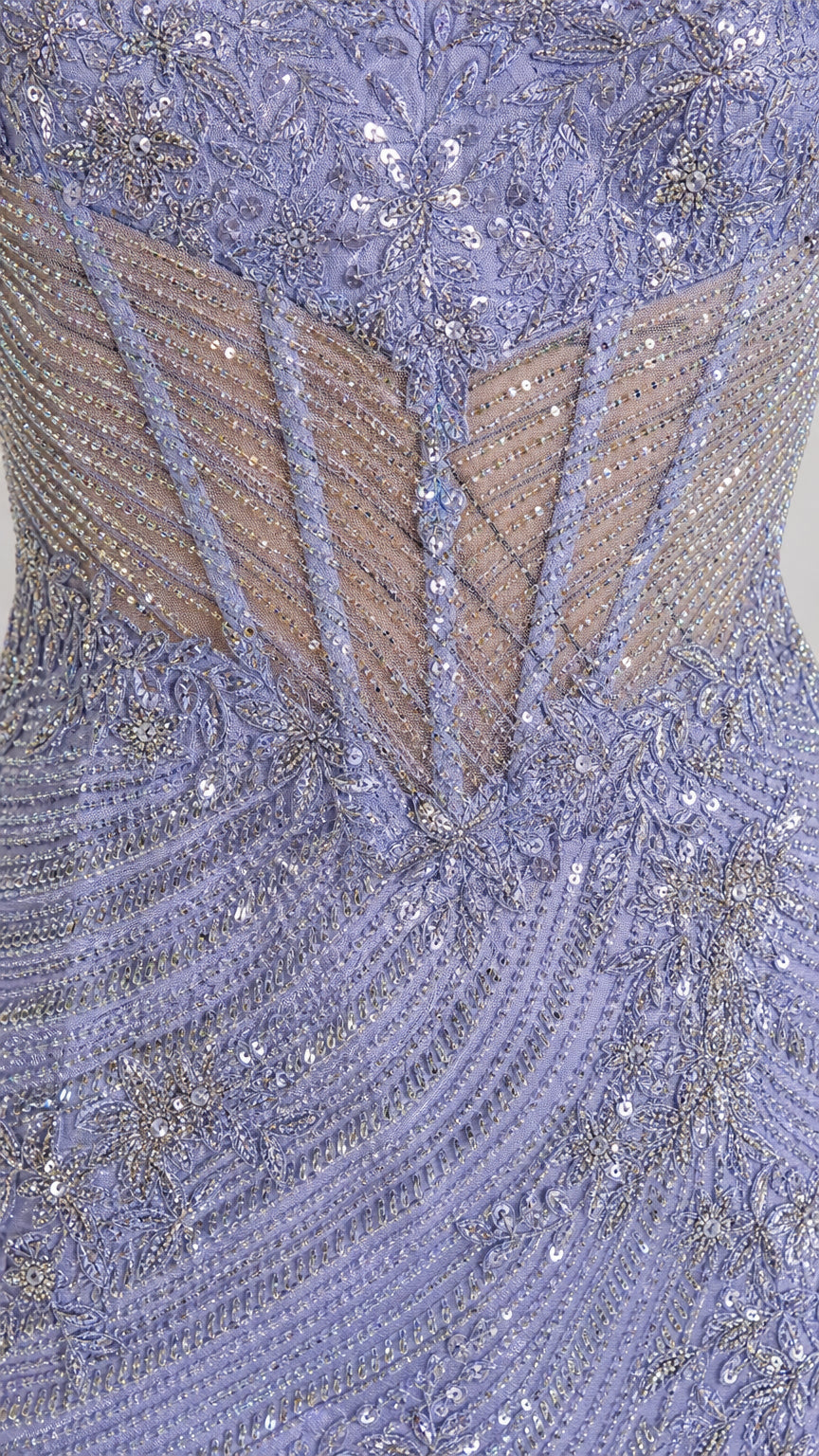 Close-up detail of sequin and bead embellishments on bodice