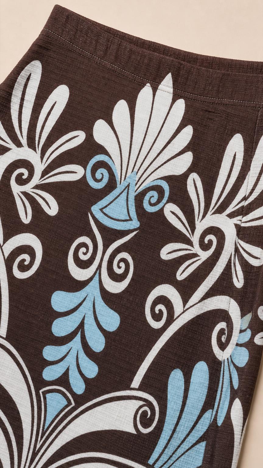 Close-up detail of the vintage-inspired brown and blue fabric print
