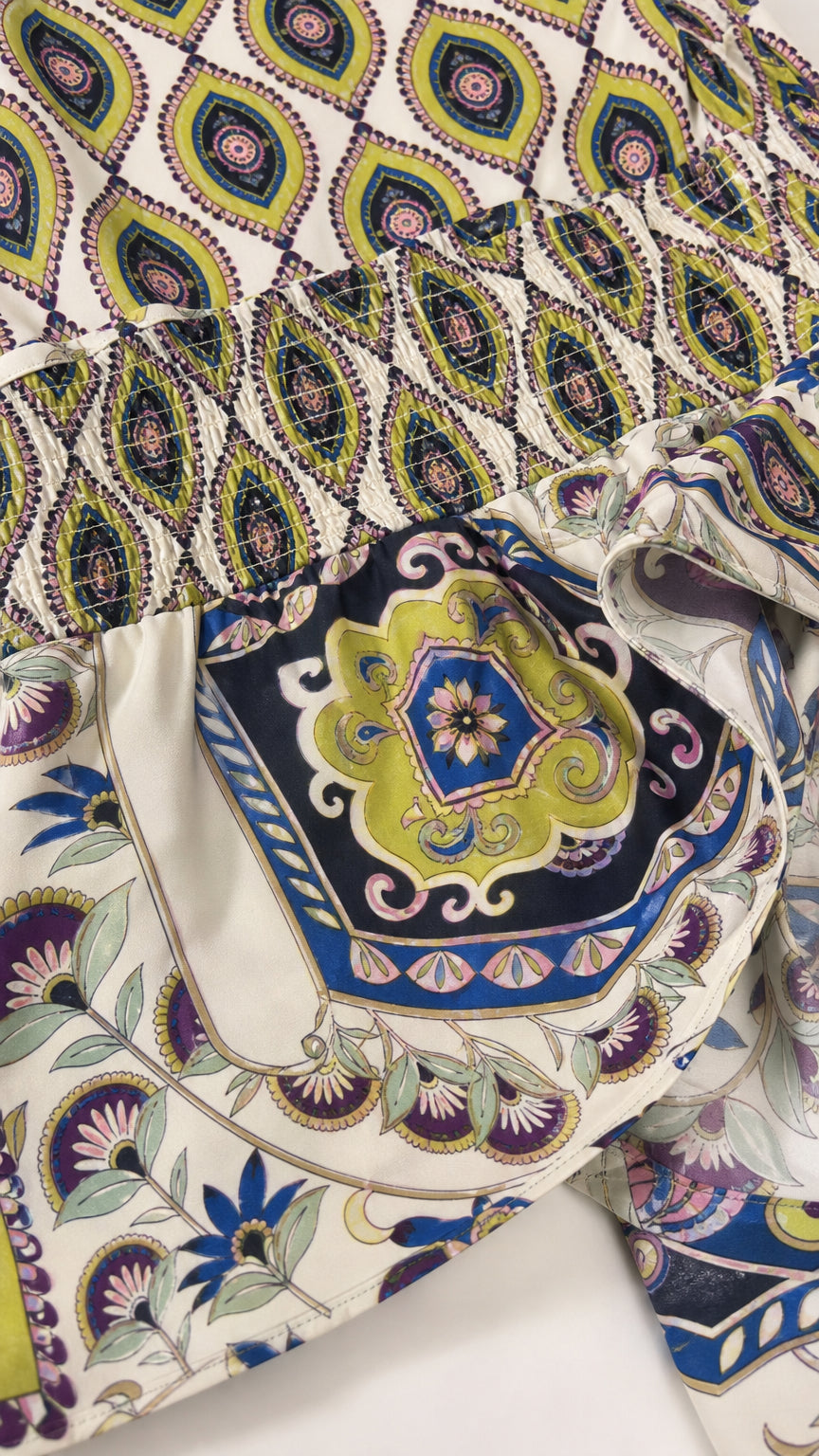 Close-up detail of fabric pattern on the strapless maxi dress