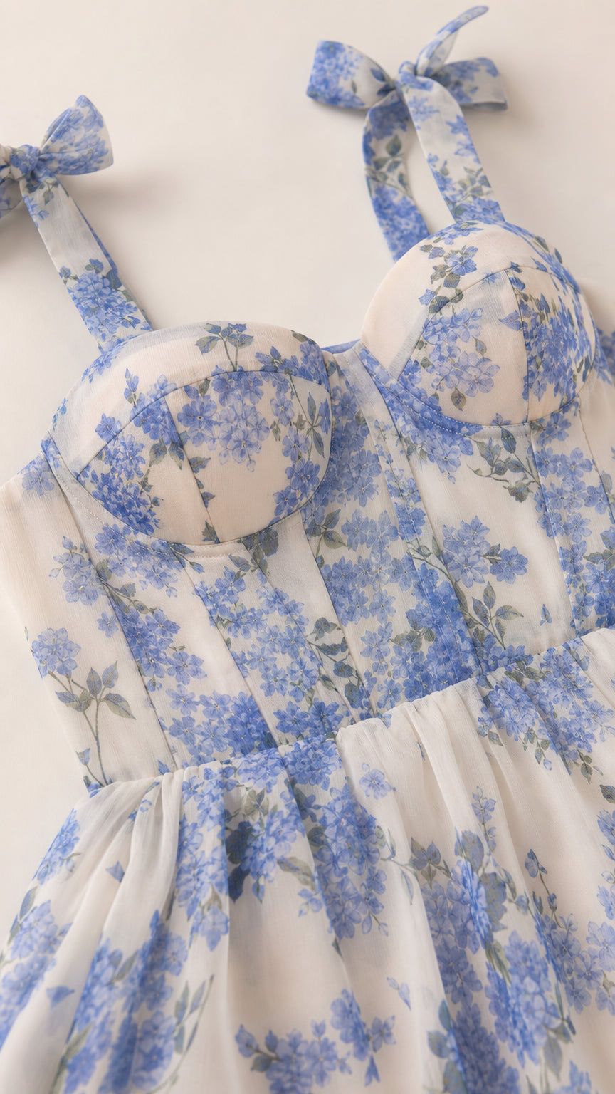 Close-up detail of sweetheart bodice and shoulder ties