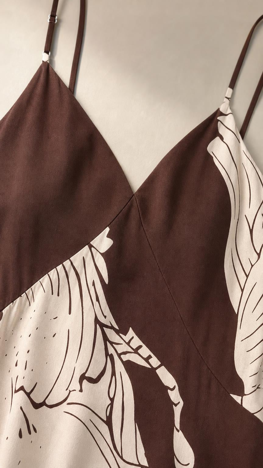 Close-up of V-neckline and strap detail