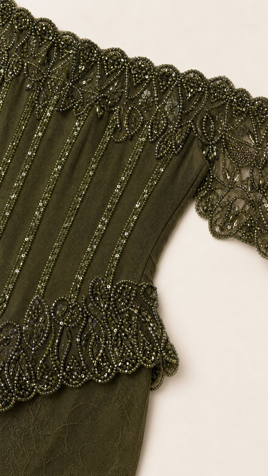 Close-up detail of beaded bodice and off-shoulder neckline