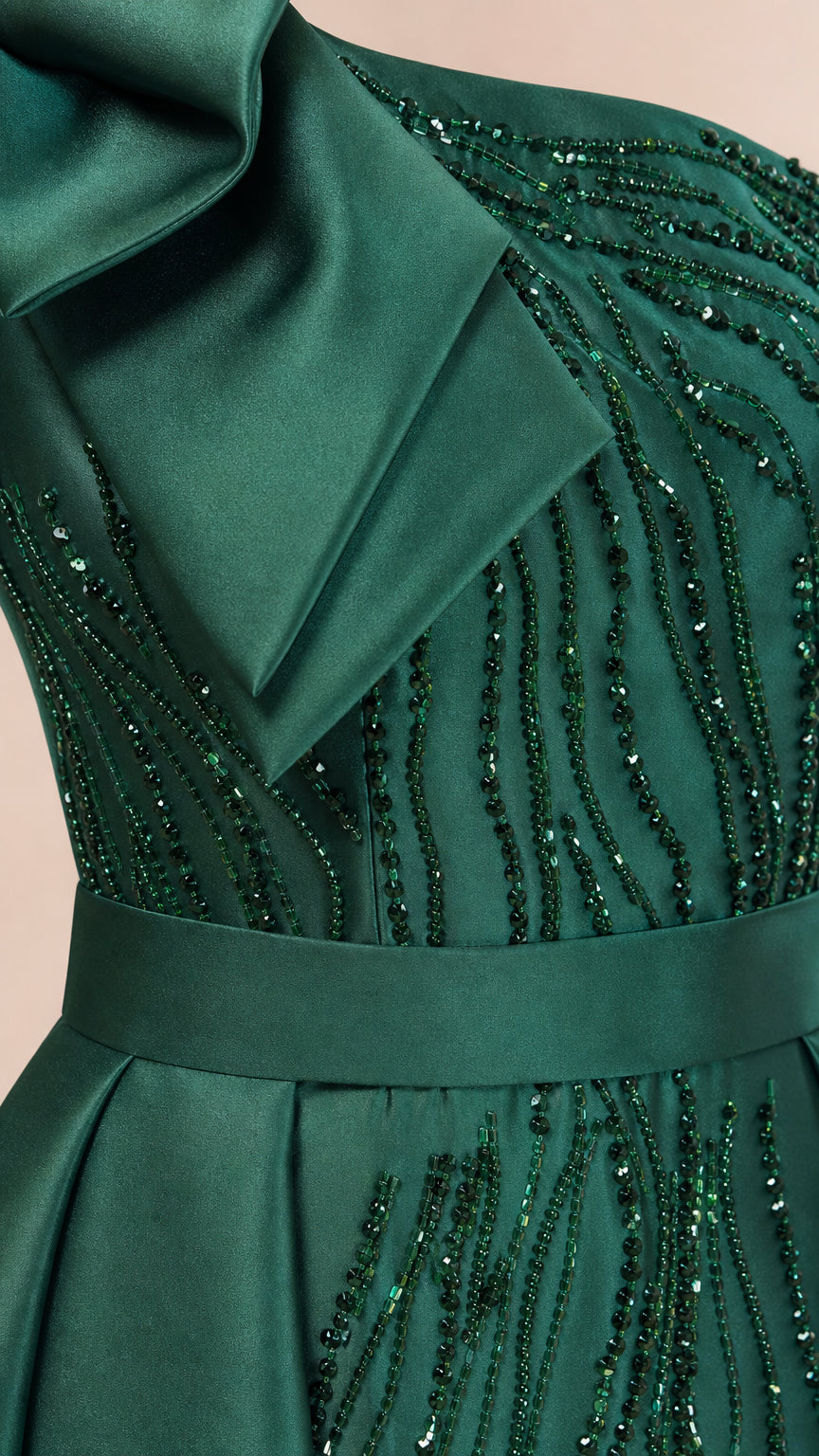 Close-up of beaded bodice and shoulder bow detail