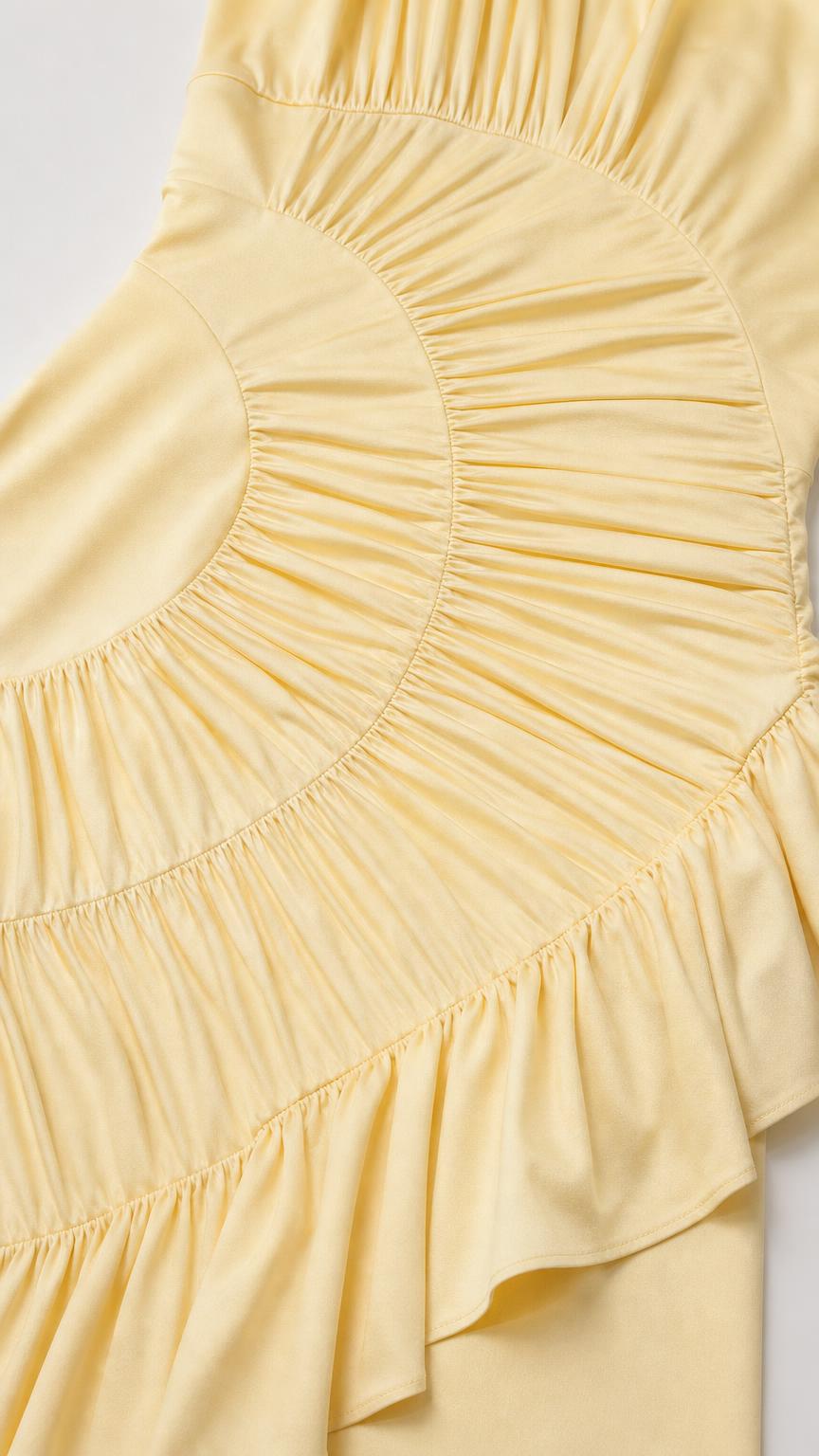 Close-up detail of sunburst ruching and ruffle on Light Yellow dress
