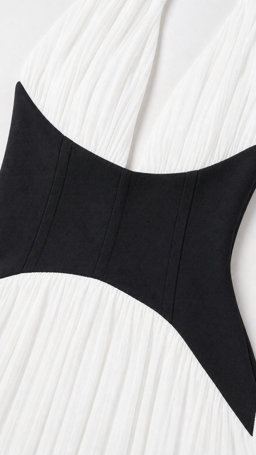 Close-up detail of contrast corset waist on dress