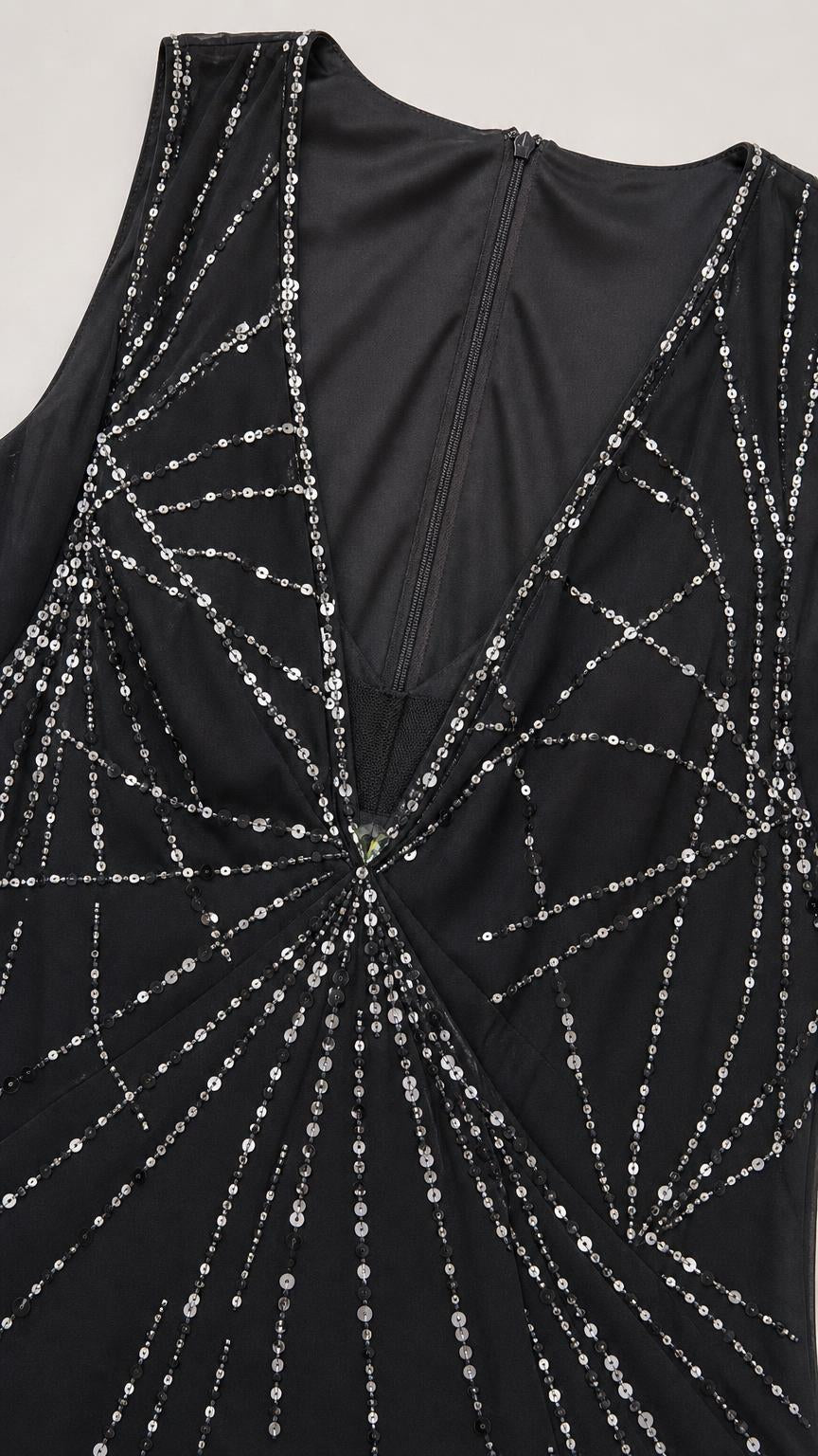 Close-up detail of Black dress bodice and beadwork