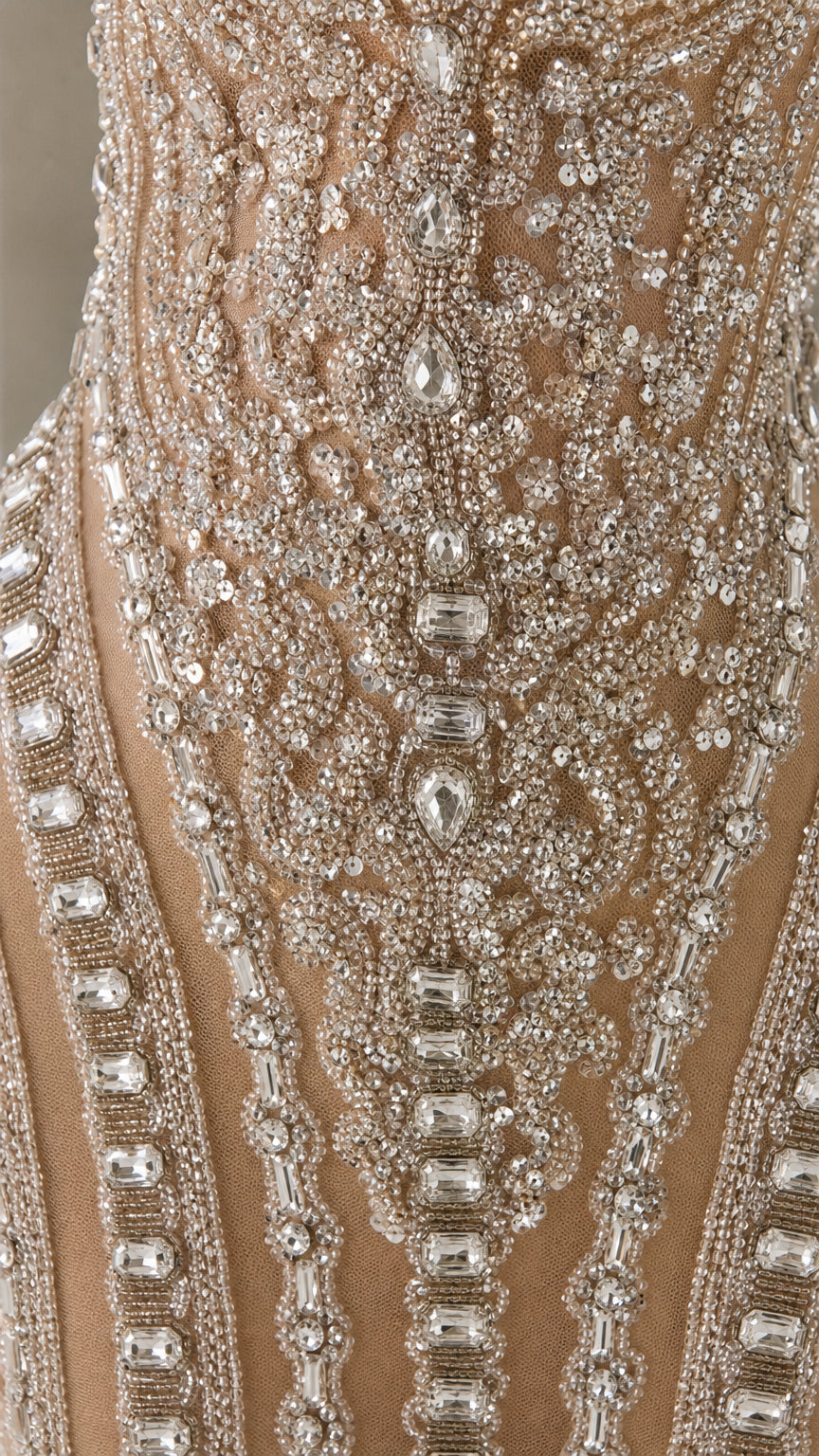 Close-up detail of intricate crystal and sequin beadwork