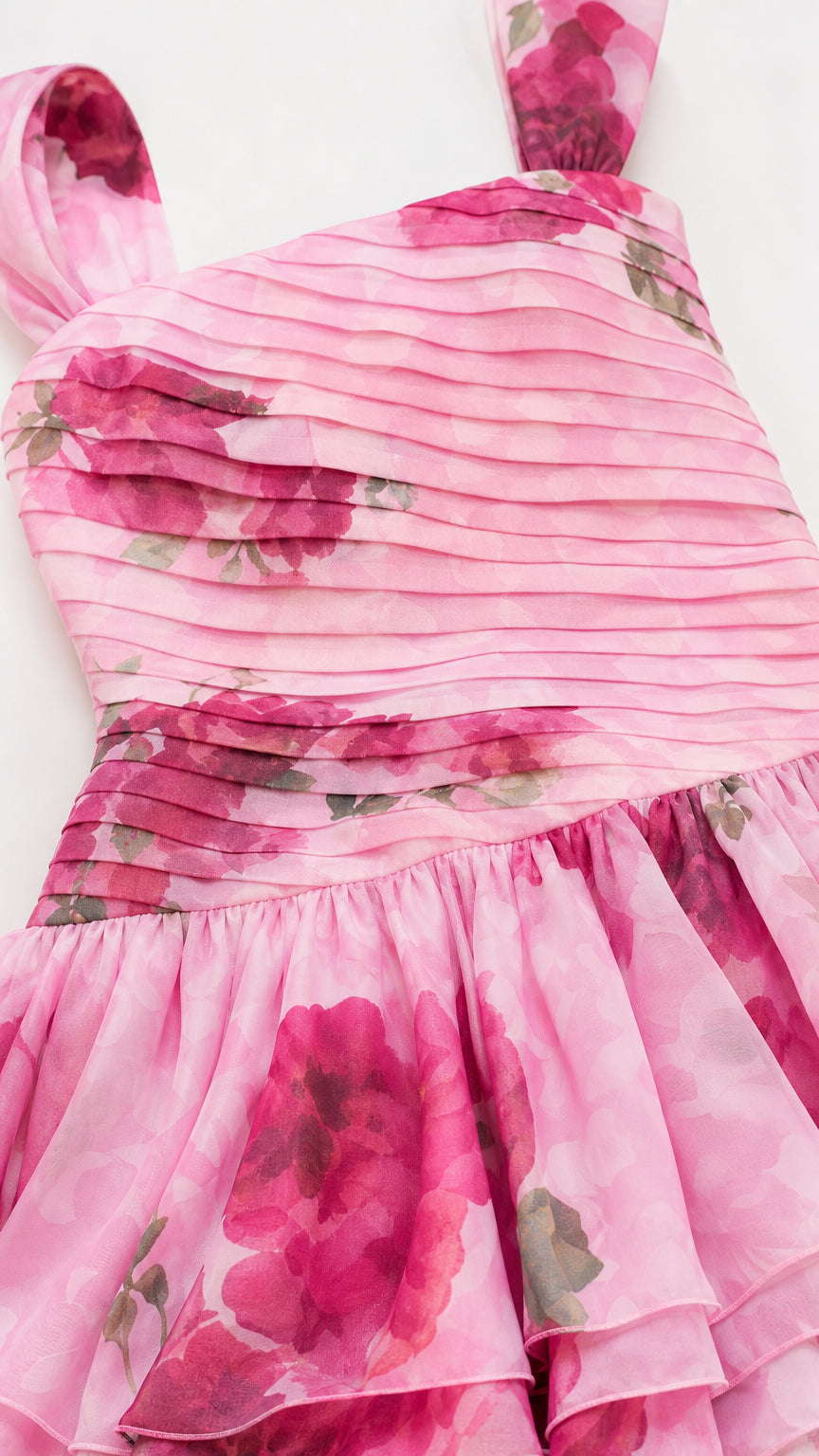 Close-up detail of pleated bodice and floral fabric