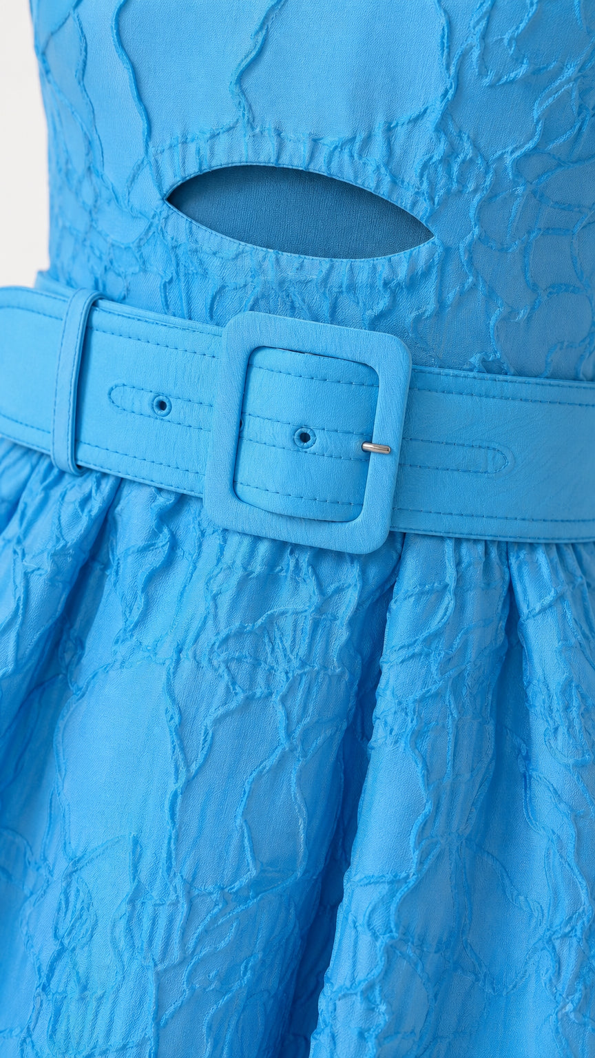 Close up of cutout detail and matching belt on blue dress