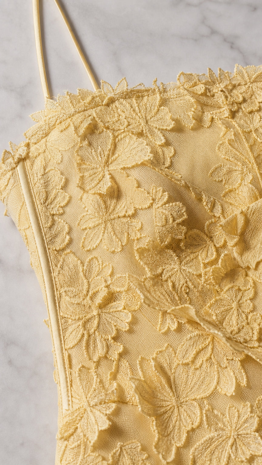 Close-up detail of yellow 3D floral bodice