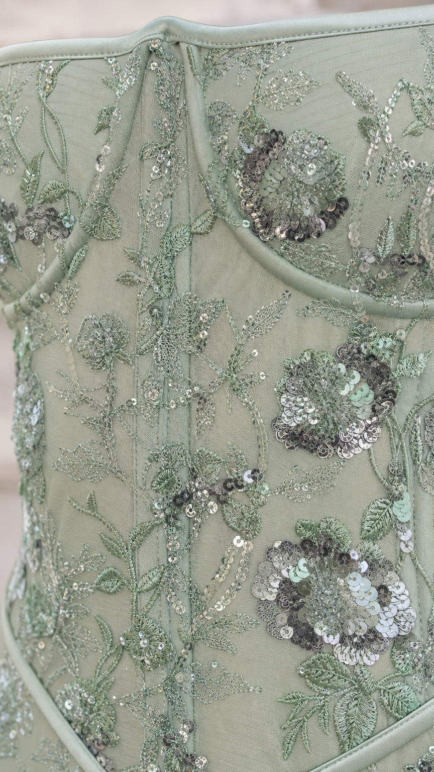 Close-up detail of floral embroidery and sequin embellishments on Sage Green bodice