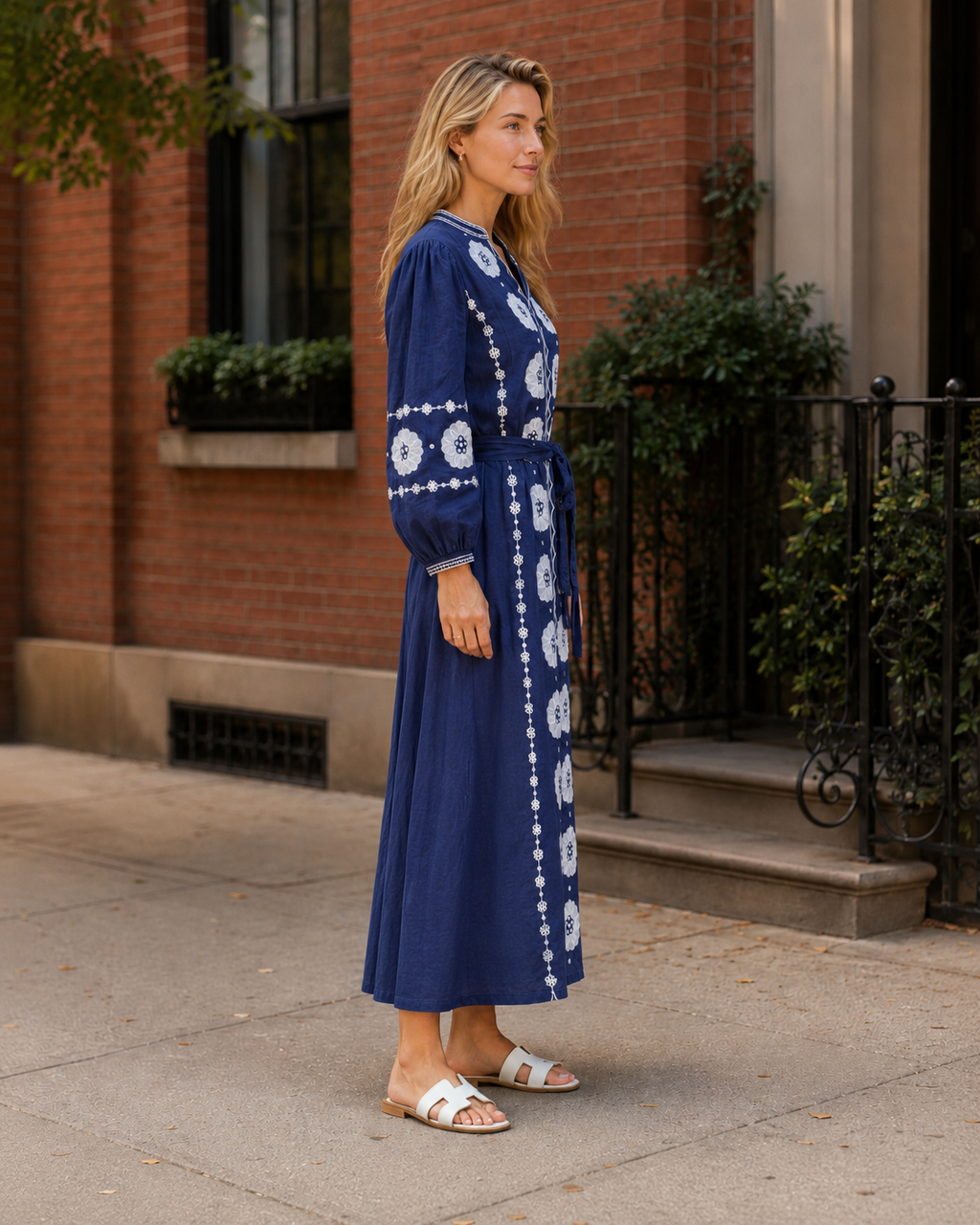 Side view of cobalt blue embroidered tie-waist midi dress